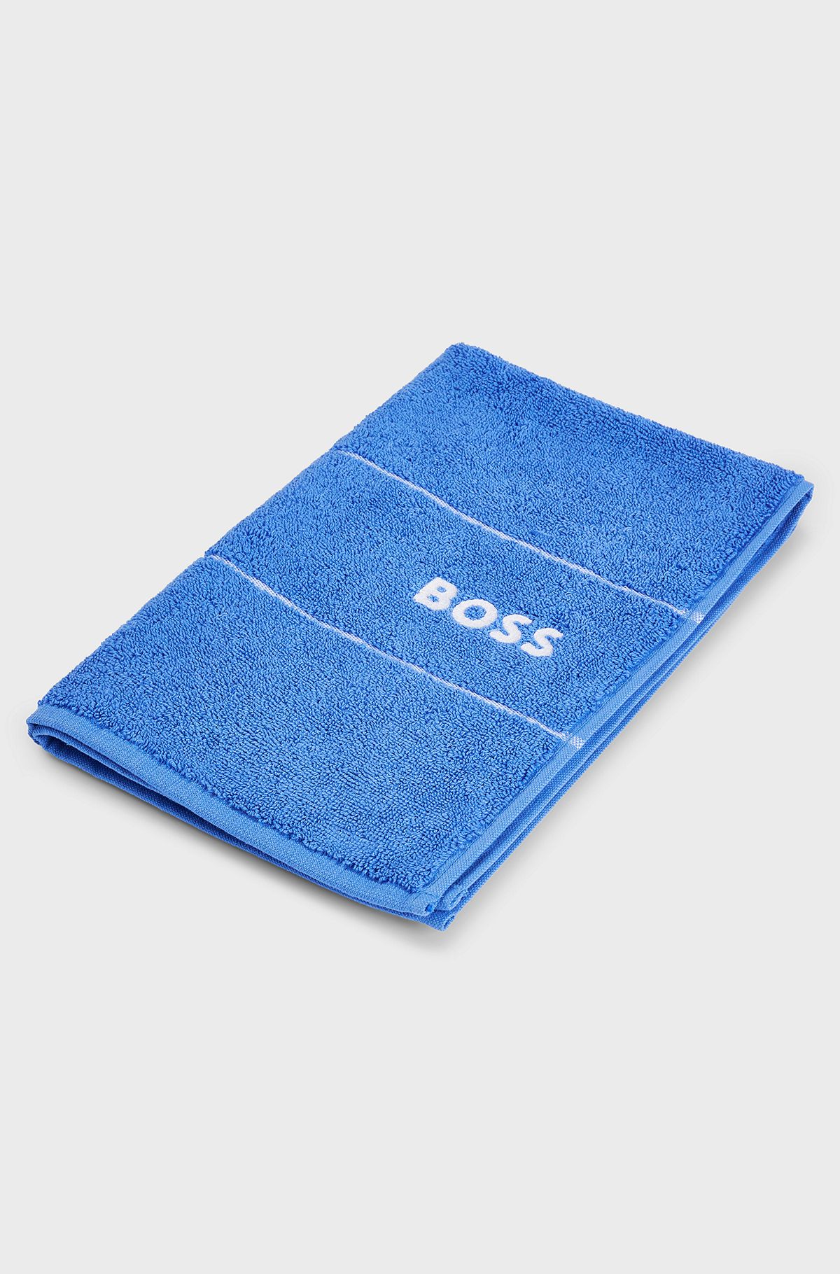 Cotton guest towel with white logo embroidery, Blue