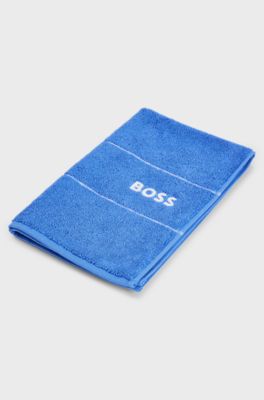 Cotton guest towel with white logo embroidery, Blue