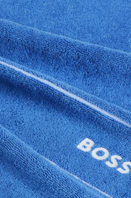 Cotton guest towel with white logo embroidery, Blue