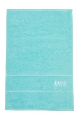 Cotton guest towel with white logo embroidery, Turquoise