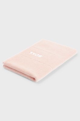 Cotton guest towel with white logo embroidery, Pink