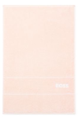 Cotton guest towel with white logo embroidery, Pink