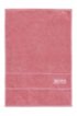 Finest Egyptian cotton guest towel with logo border, light pink