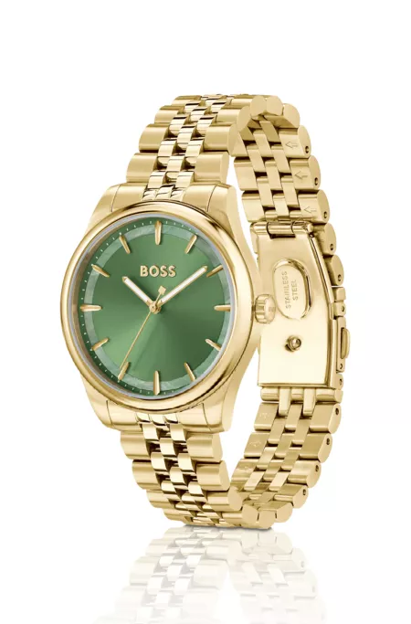 Gold-tone watch with green dial and pearlescent inlay