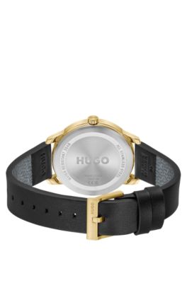 Guldf&auml;rgad klocka med svart l&auml;derarmband, Guld