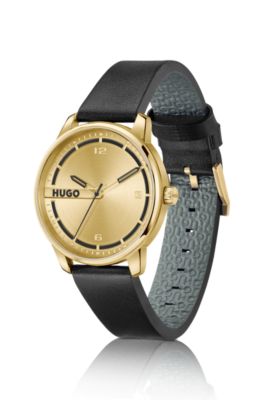 Guldf&auml;rgad klocka med svart l&auml;derarmband, Guld