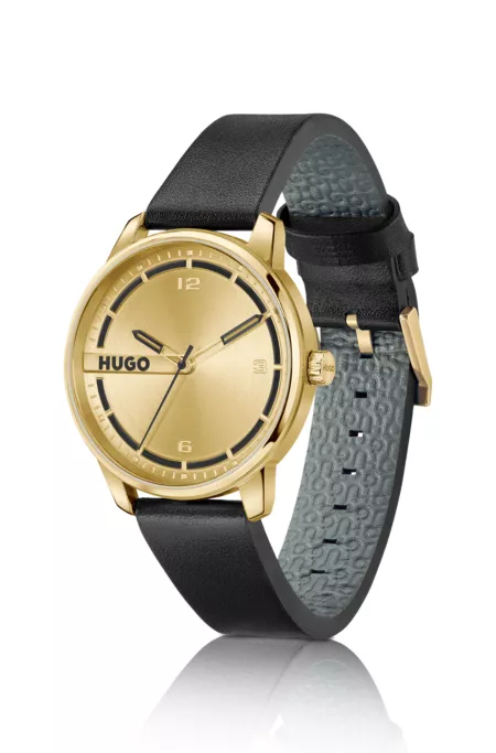 Gold-tone watch with black leather strap
