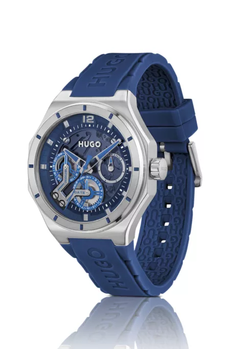 Skeleton-dial watch with blue silicone strap