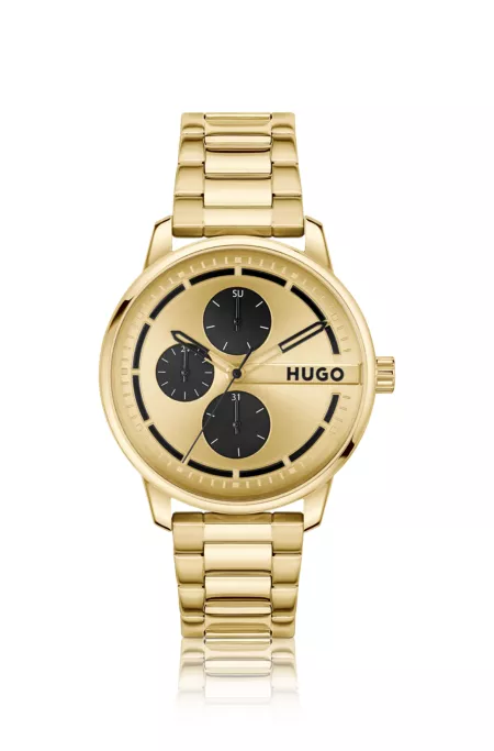 Gold-tone watch with black subeyes