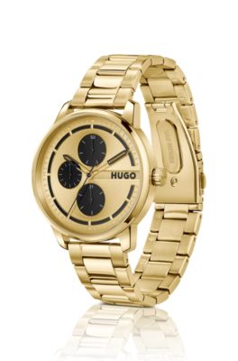 Goldfarbene Uhr mit schwarzen Subeyes, Gold