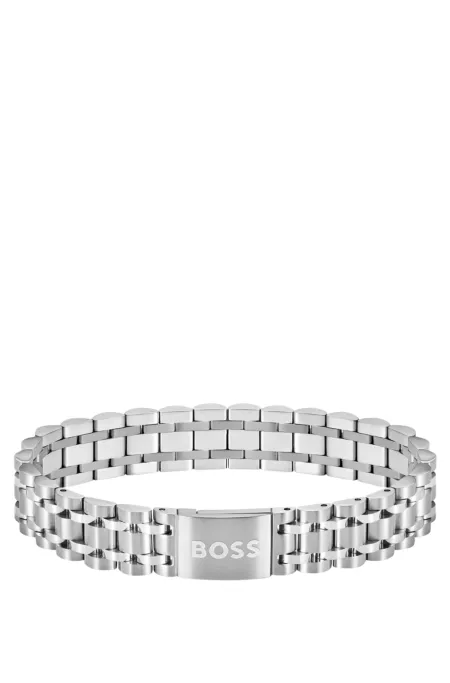 Silver-tone cuff with magnetic logo closure