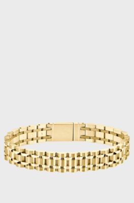 Gold-tone cuff with logo-engraved magnetic closure, Gold tone