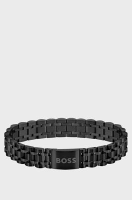 Black-steel cuff with magnetic logo closure, Black