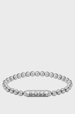 Silver-tone cuff with logo closure, Silver tone