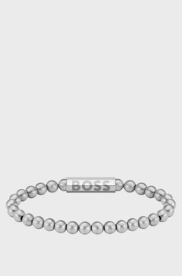 Silver-tone cuff with logo closure, Silver tone