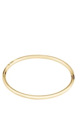 Gold-tone bangle with logo detail 1