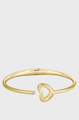 Gold-tone bangle with open-heart detail, Gold tone