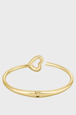 Gold-tone bangle with open-heart detail, Gold tone