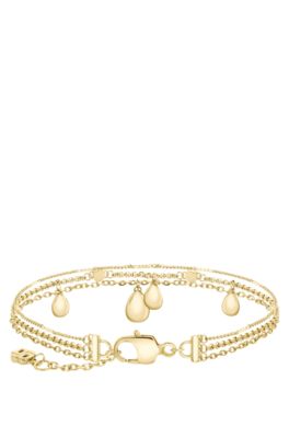 Silverf&auml;rgat armband i tre lager med droppberlocker, Guldf&auml;rg