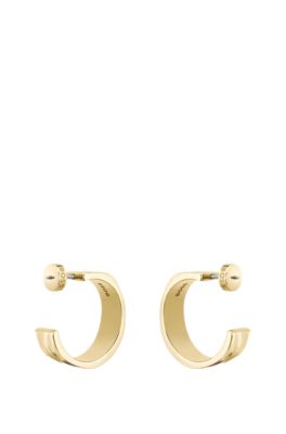 Gold-tone hoop earrings with ripple design, Gold tone