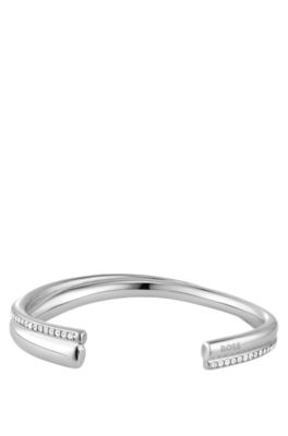 Silberfarbener, geschwungener Armreif mit Kristallverzierungen, Silberfarben