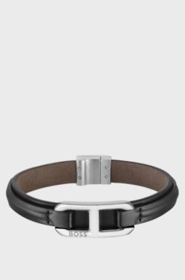 Layered leather cuff with branded silver-tone link , Black