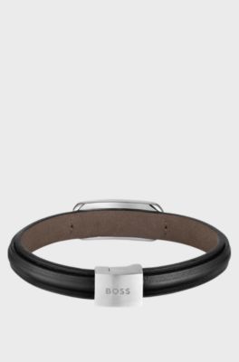 Layered leather cuff with branded silver-tone link , Black