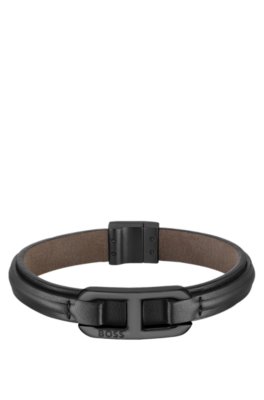 Layered leather cuff with branded black metallic link