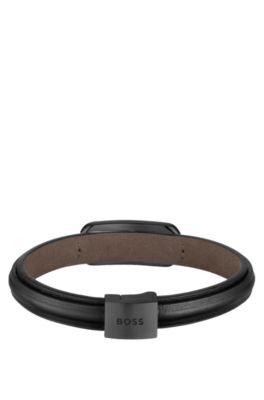 Layered leather cuff with branded black metallic link, Black