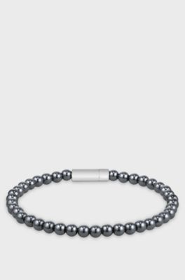 Hematite-bead cuff with logo closure, Dark Grey
