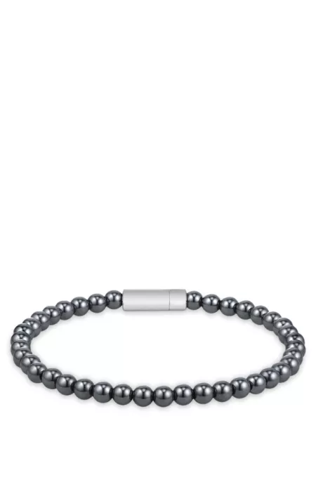 Hematite-bead cuff with logo closure
