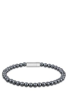 Hematite-bead cuff with logo closure
