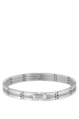 Silver-tone striped cuff with logo clasp