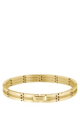 Gold-effect striped cuff with logo clasp