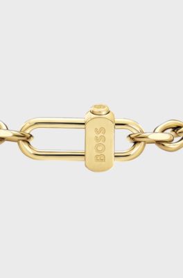 Masculine bracelet with engraved logo, Gold tone