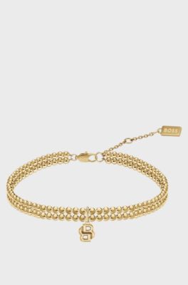 Double-row bracelet in a light-yellow-gold tone , Gold tone