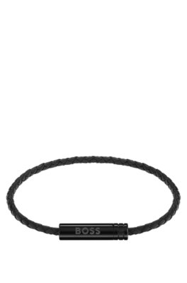 Braided cuff in black leather with logo plaque