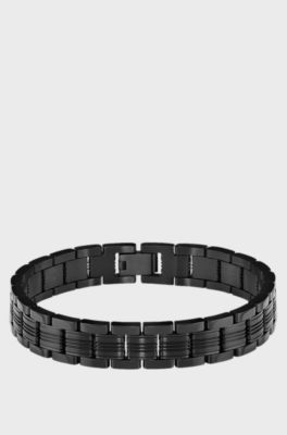 Watch-style cuff in black with engraved logo, Black