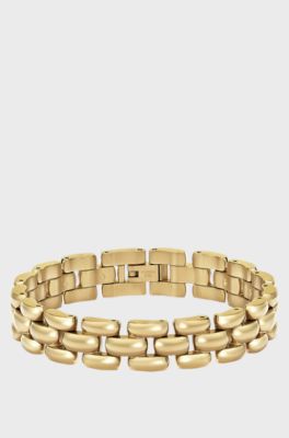 Polished bracelet with engraved logo detail, Gold tone