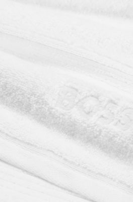 White Aegean-cotton hand towel with tonal logo, White