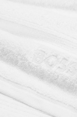White cotton hand towel with embroidered logo, White