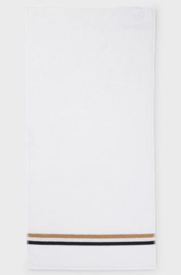 Cotton hand towel with signature-stripe border, White