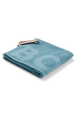 Cotton hand towel with tonal logo, Turquoise