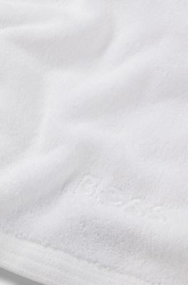 Cotton hand towel with contrast embroidered logo, White