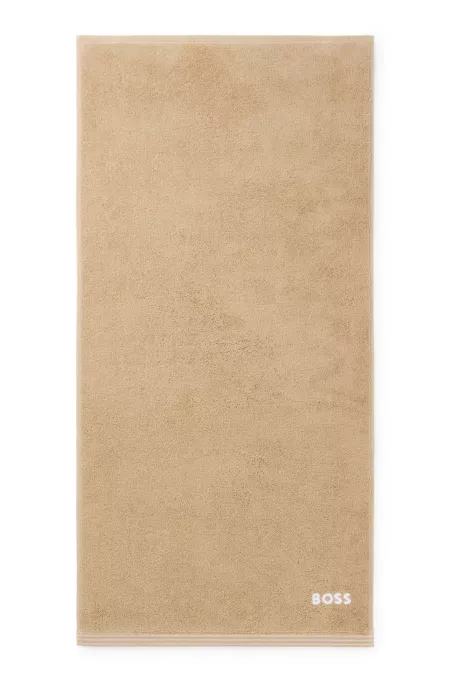 Toalla de mano de algodón con logo bordado en contraste