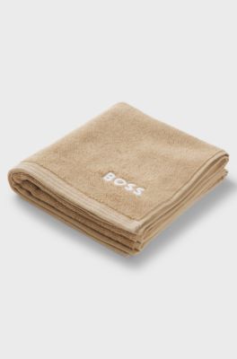 Cotton hand towel with contrast embroidered logo, Beige