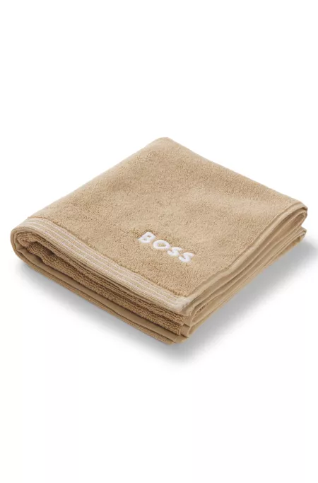 Toalla de mano de algodón con logo bordado en contraste