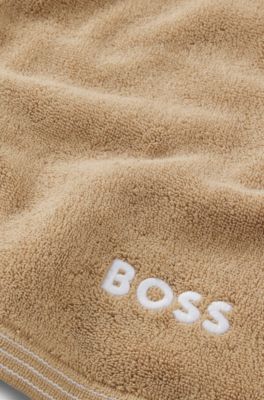 Cotton hand towel with contrast embroidered logo, Beige