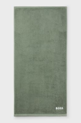 Cotton hand towel with contrast embroidered logo, Green