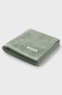 Cotton hand towel with contrast embroidered logo, Green